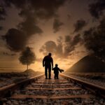 father and son, walking, railway-2258681.jpg